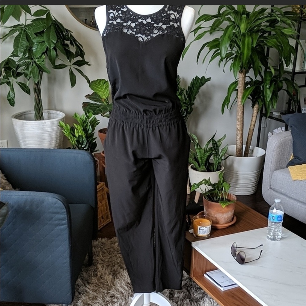 Express black lace jumpsuit with pockets